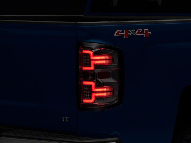 Raxiom 14-18 Chevrolet Silverado 1500 LED TailLights/SeqTurn Signals- Chrome- Smoked Lens-thumbmail-3