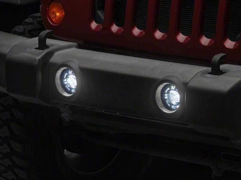 Raxiom 07-18 Jeep Wrangler JK V2 LED Switchback Fog Lights with Amber Turn Signal and Halo Rings-thumbmail-4