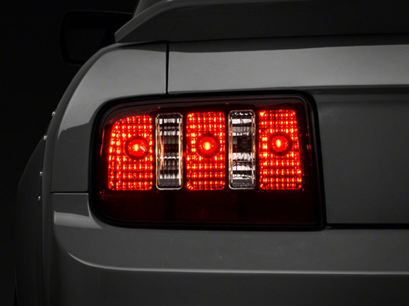 Raxiom 05-09 Ford Mustang Coyote Tail Lights- Blk Housing (Smoked Lens)-thumbmail-1