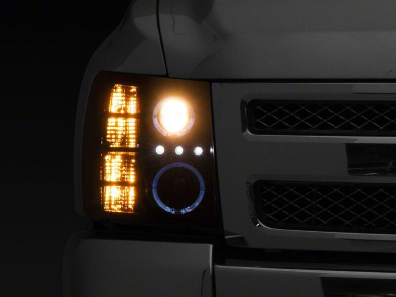 Raxiom 07-13 Chevrolet Silverado 1500 LED Halo Projector Headlights- Black Housing- Clear Lens-thumbmail-1