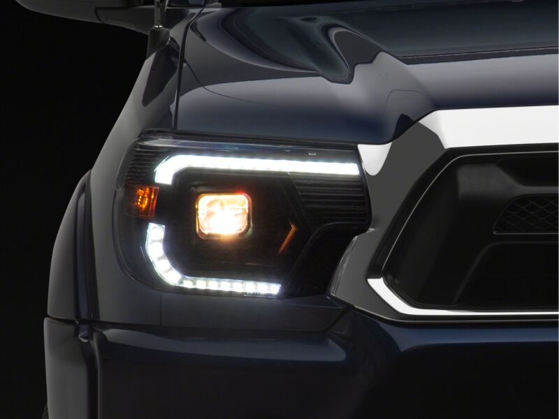 Raxiom 12-15 ToyotaTacoma Axial Series Switchback Projector Headlights- Black Housing- Clear Lens-thumbmail-3