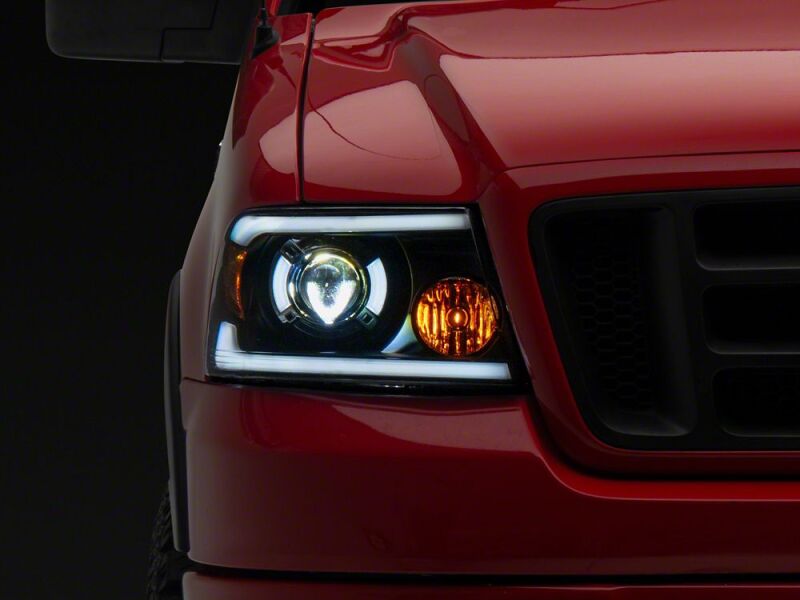 Raxiom 04-08 Ford F-150 Axial Series LED Proj Hlights/Seq LED Bar- Black- Clear Lens-thumbmail-1
