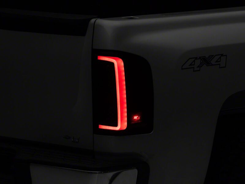 Raxiom 07-13 Chevrolet Silverado 1500 G2 LED Tail Lights- Black Housing- Smoked Lens-thumbmail-1