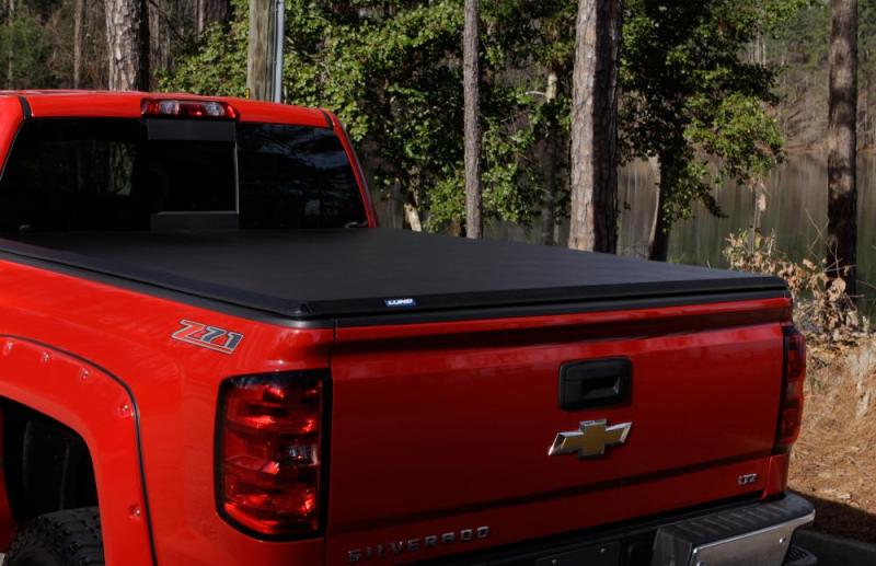 Lund 04-14 Chevy Colorado Styleside (5ft. Bed) Hard Fold Tonneau Cover - Black