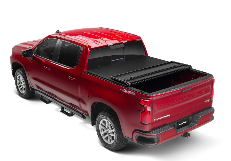 Lund 04-14 Chevy Colorado Styleside (6ft. Bed) Hard Fold Tonneau Cover - Black